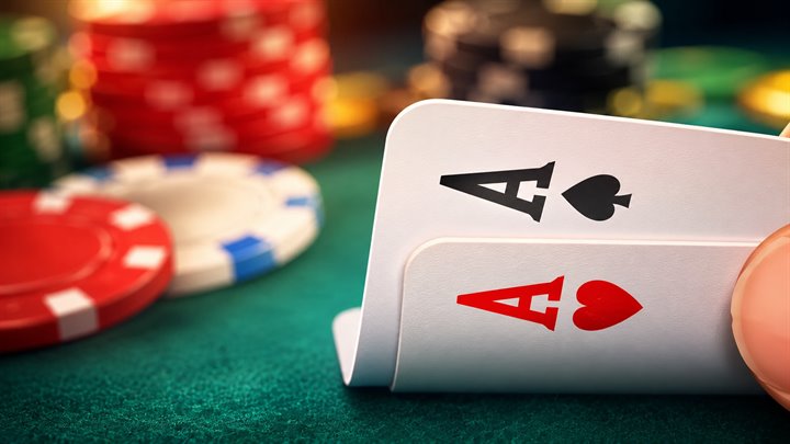 Pocket aces on a poker table